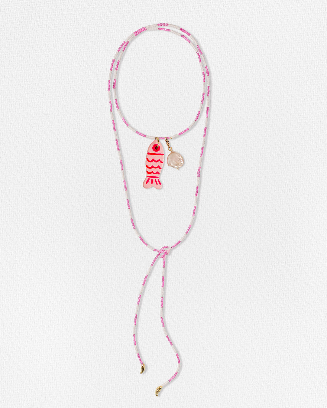 Corbatín pez y perla barroca