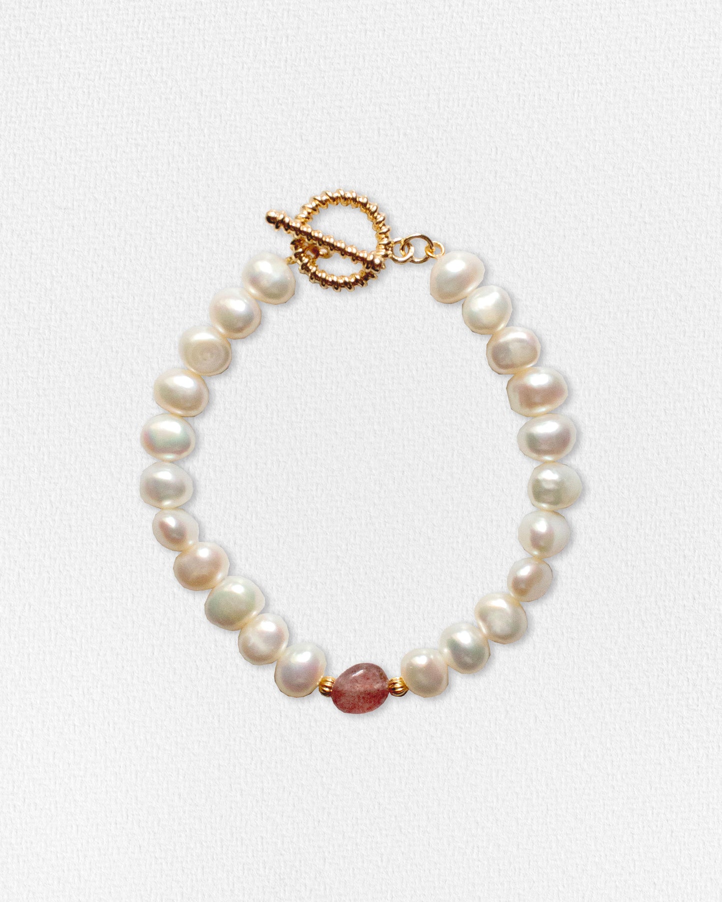 Pulsera de perlas con piedra lila